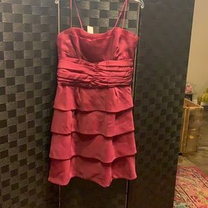 Berry colored cocktail dress with ruffle design